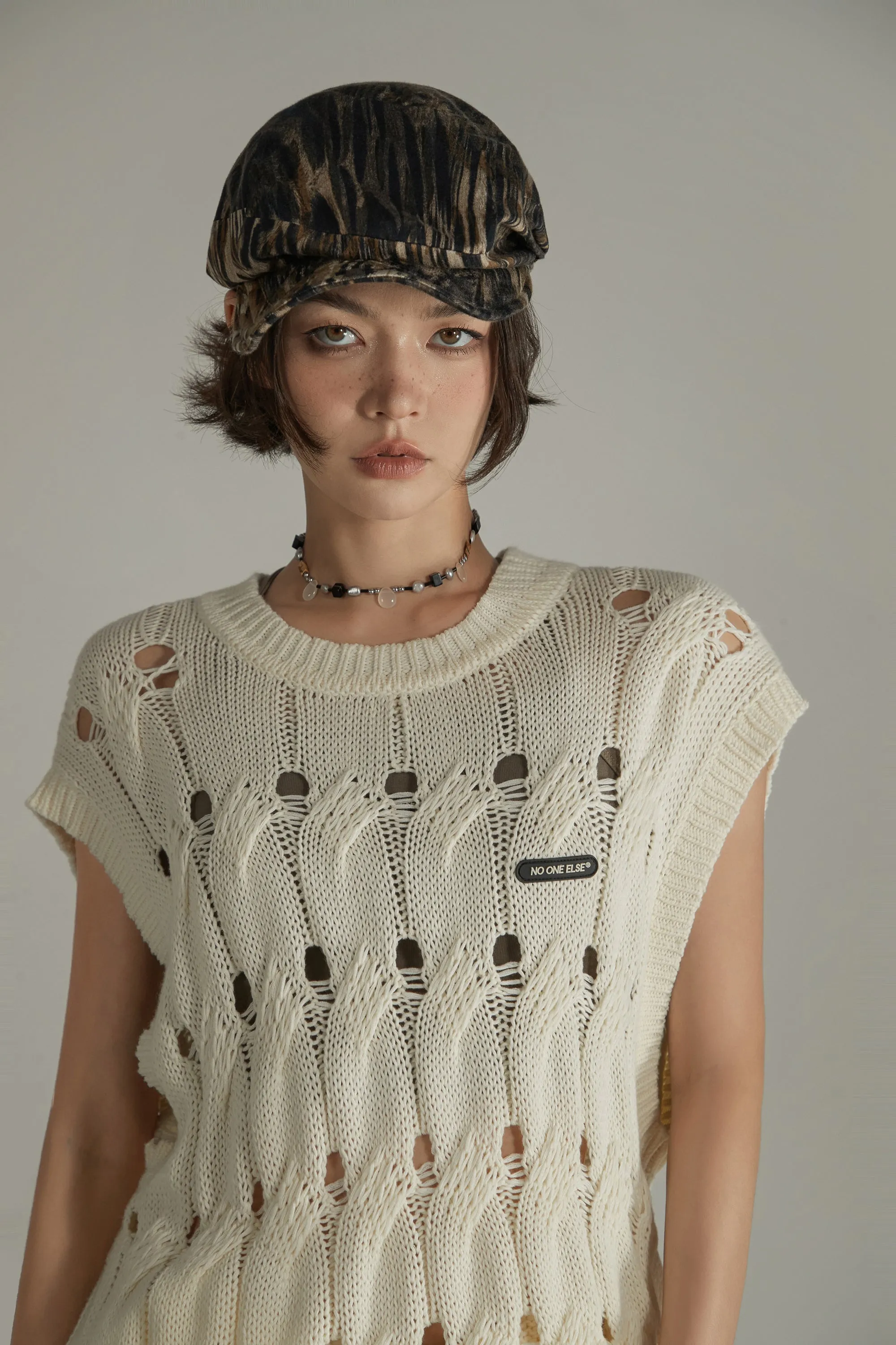 Hollow Sleeveless Knitted Sweater