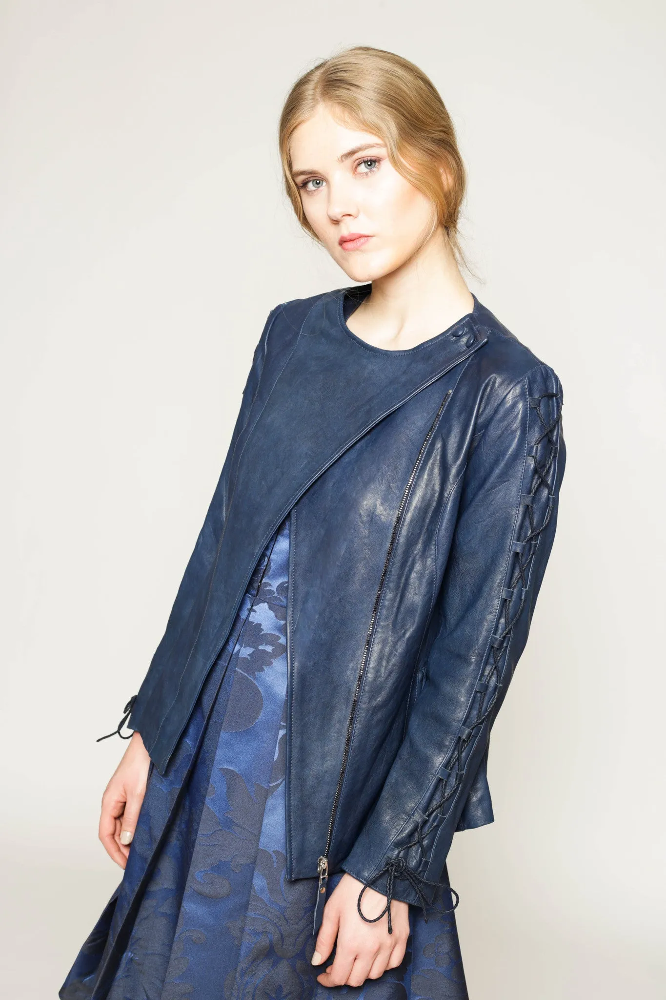 Vegetable dyed leather jacket with lace-up sleeves